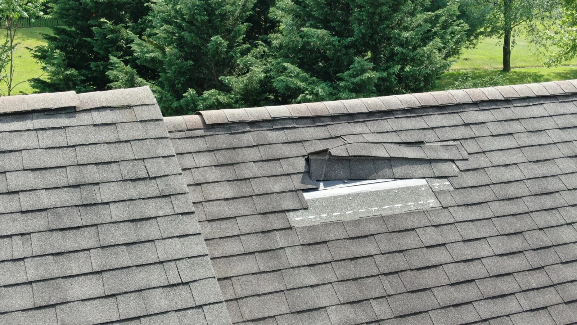 Storm damage roof repair on a home in Rochester, NY